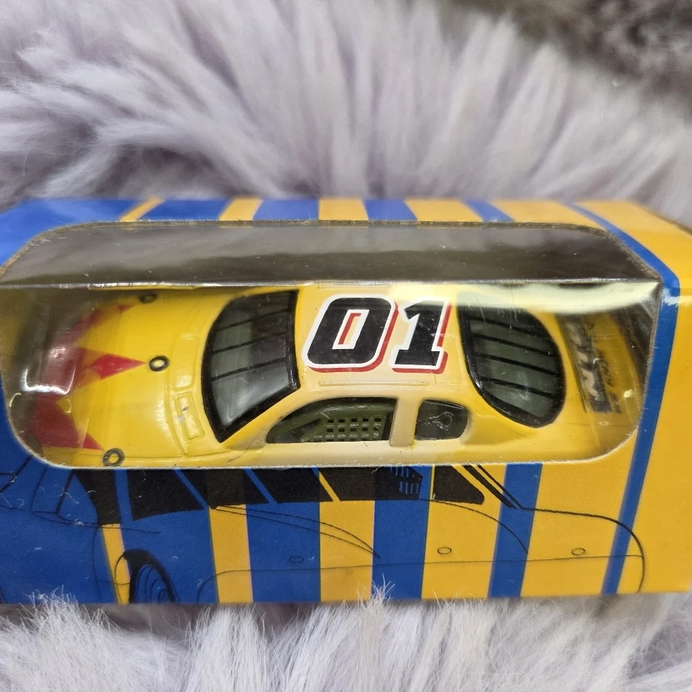 Vintage National Tire Battery Racing Yellow Blue Die-Cast Toy Car